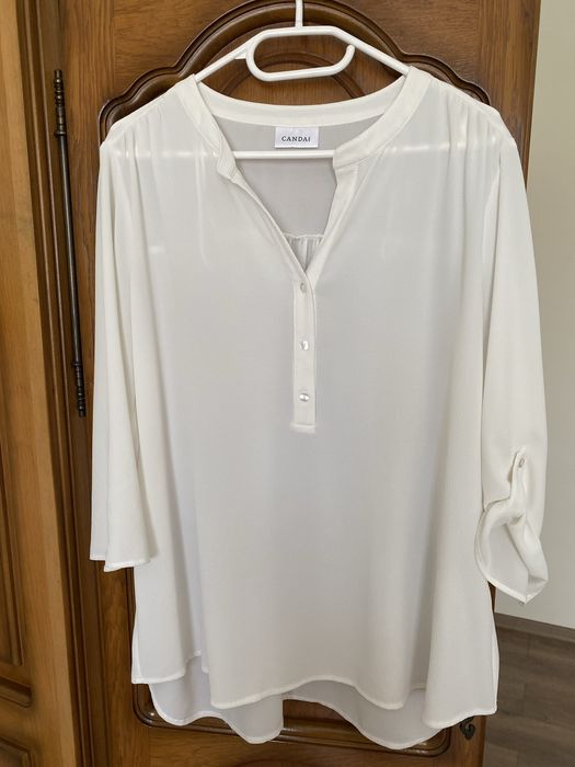 Set de 2 fuste conice si bluza eleganta cu dimensiuni afisate