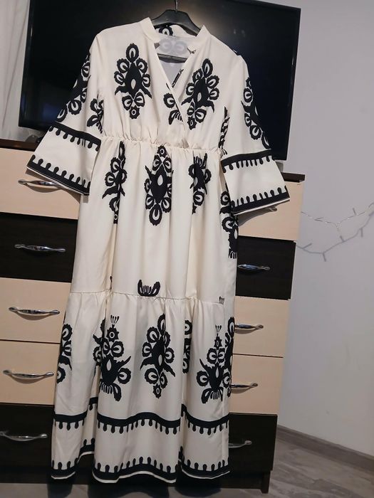 Vând rochi de dama L