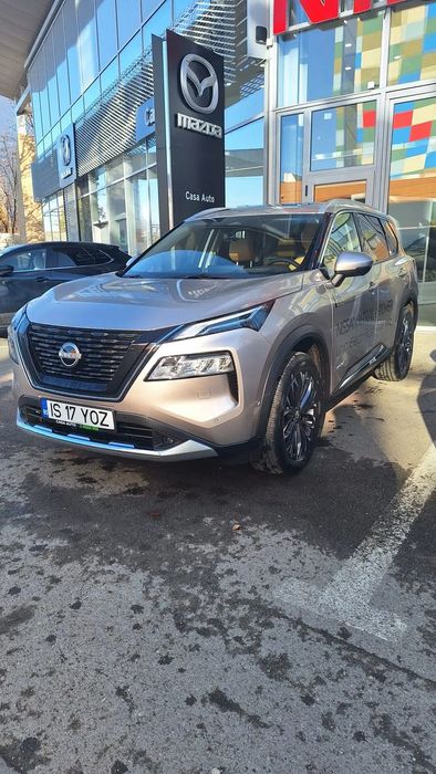 Nissan X-Trail Nissan X-Trail e-4ORCE 211CP TEKNA+P2 Bej 46.458€ Predare Imediat