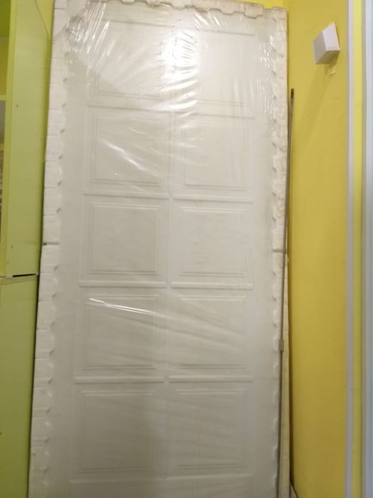 Новая дверь в упаковка