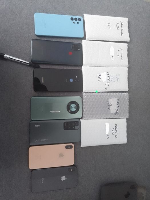 Vind telefoane recarosate întrebați de pret