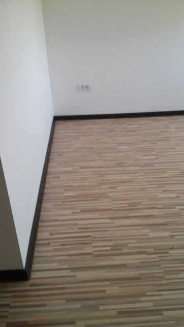 La 20 lei mp montaj parchet laminat spc