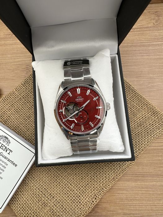 Ceas Orient Contemporary Red Dial Open Heart RA-AR0010R10B