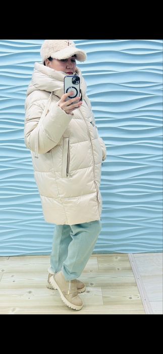 Куртки пуховики.