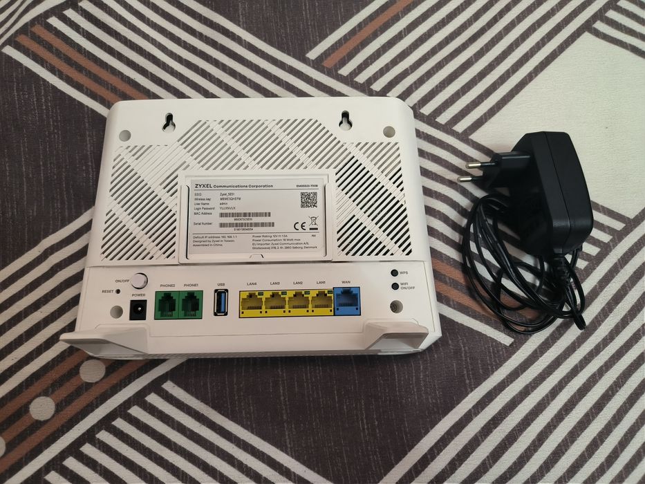 Продам  Wi-Fi роутер Оптика ZYXEL EMG5523-T50B 2.4ГГц и 5 ГГц
