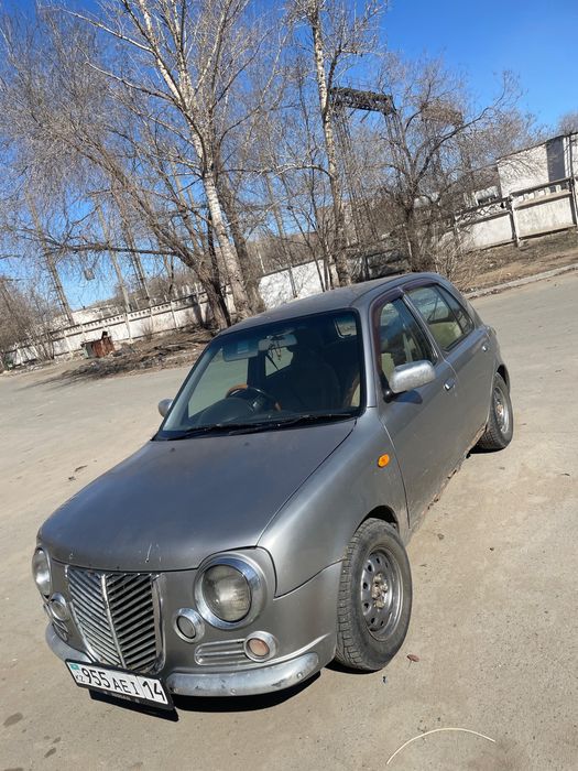 Продам Nissan march 2000