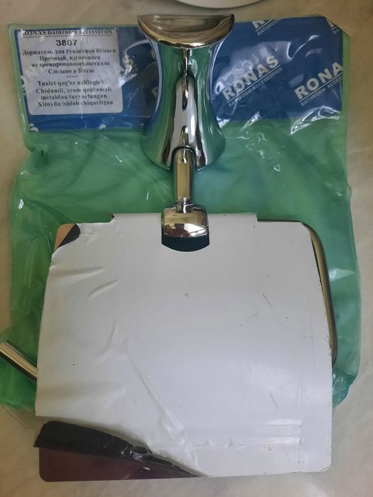 Держатель для туалетной бумаги хромированный.Новый