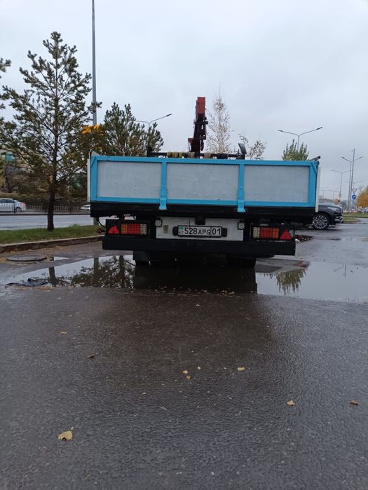 Бортовой манипулятор Mitsubishi Fuso