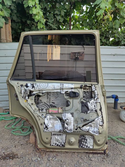 Двери нексия 2009