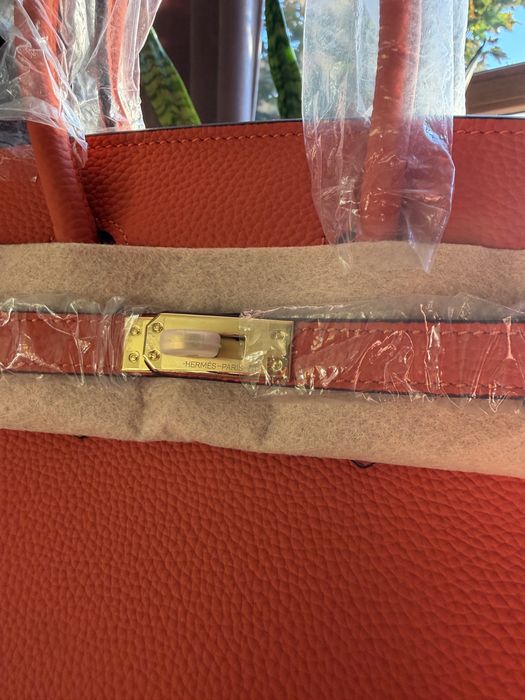 Geantă Hermès Birkin portocalie cu charm – nouă