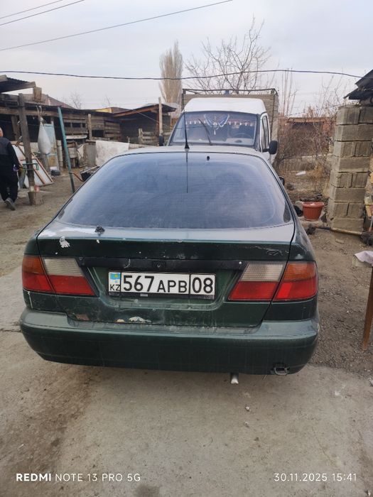 Ниссан примера р11