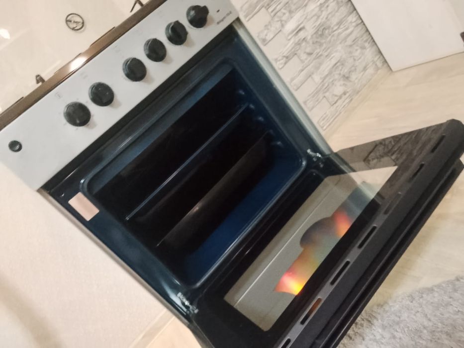 Продам комбинированную плиту