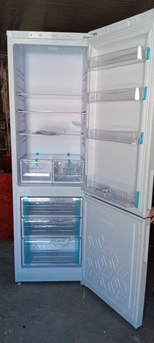 Холодильник жаңа