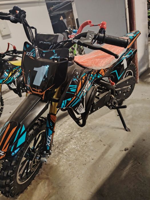 Cross pentru copii XTL 49cc 2 timpi Nou adus din Germania
