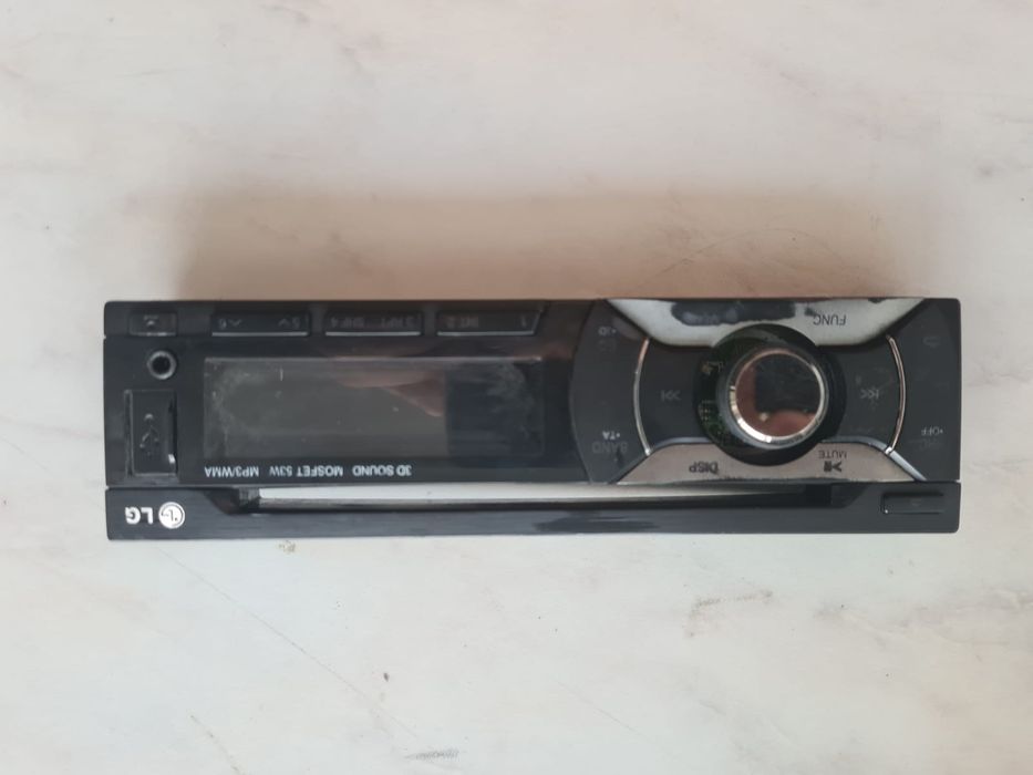 Продам магнитолу LG