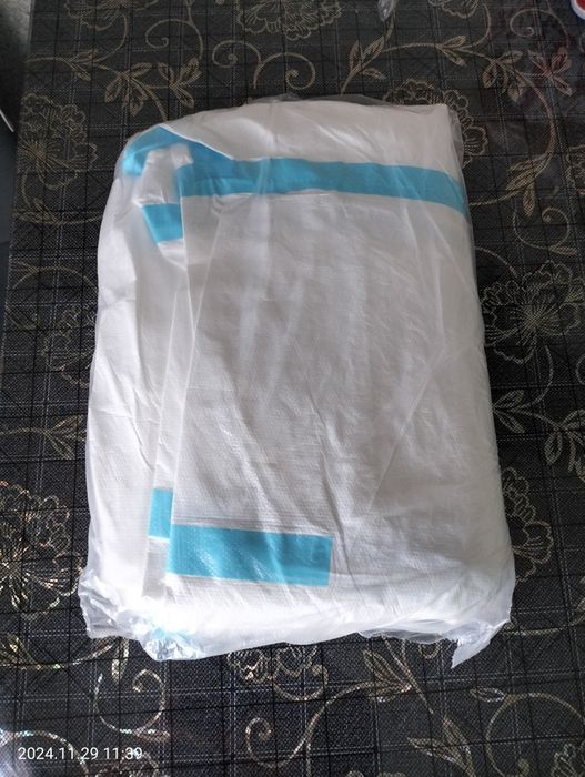 Продам комбезы одноразовые