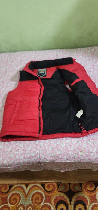 Модненькие.красивые безрукавочки.теплые.удобные