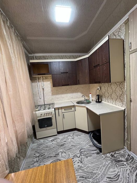 2-мактаб ёнида кв сотилади 2/1/5