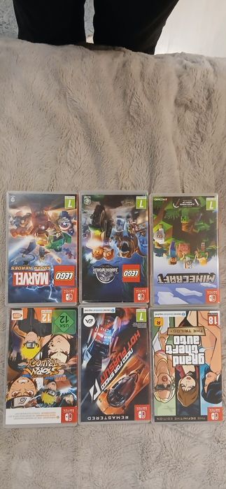 Nintendo Switch с 6 игри, протектор, гуменки за джойстик и кейс