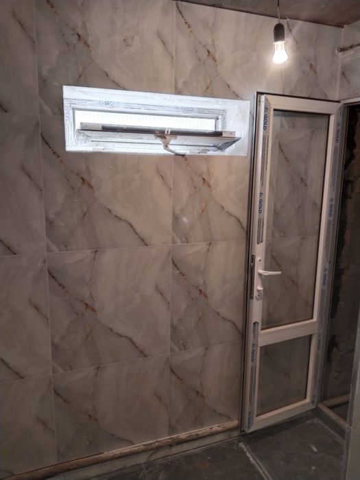 Кафельшик плиточник