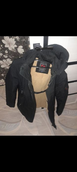 Зимний пуховик б/у