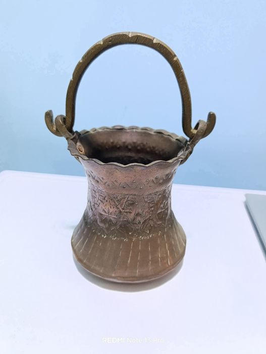 Старо менче 
С видни следи от патина по гравюрите 
Менчето е медно 
А