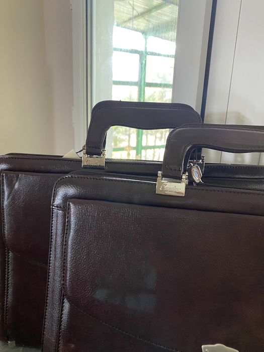 Портфели новые