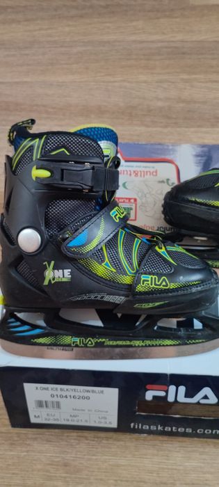 Коньки прогулочные с хоккейным лезвием.