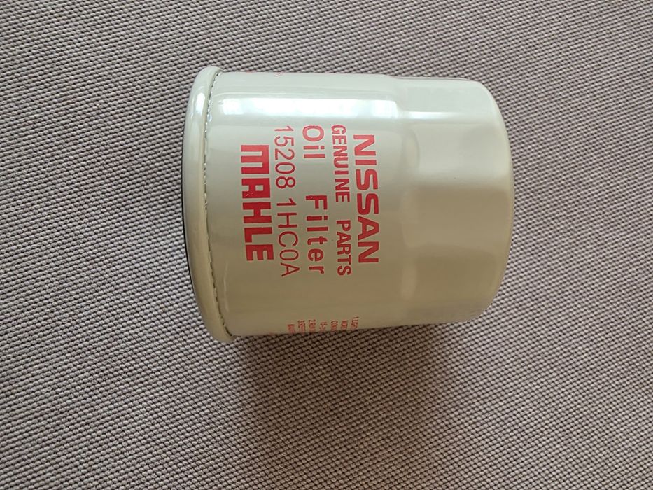 ПРОМОЦИЯ - Продавам 4броя Запалителни Свещи и Маслен филтър за Нисан