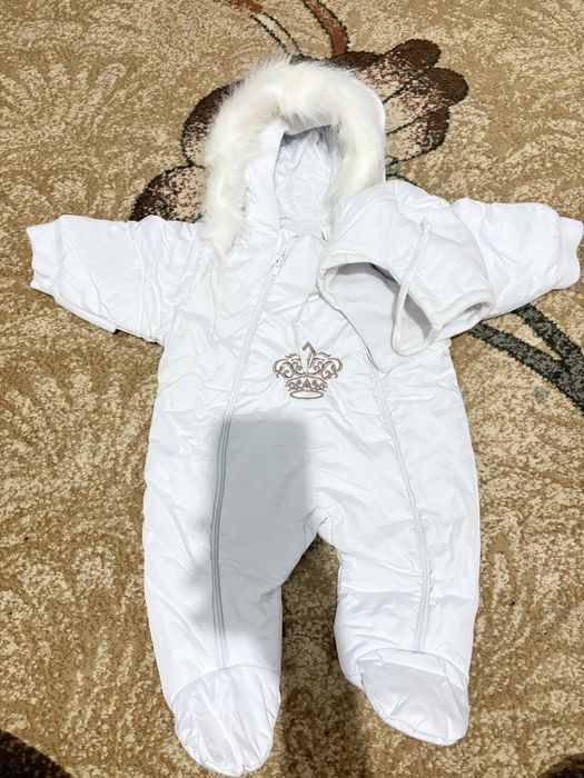 Комбинезон новорожденным