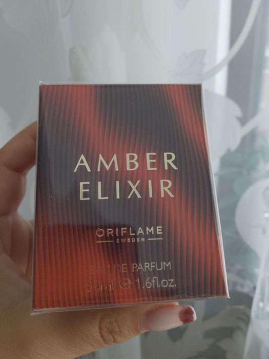 Vând parfum Amber elixr,nou