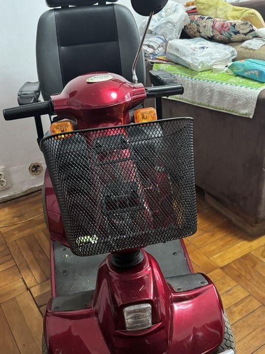 Scuter electric pt pers.cu handicap