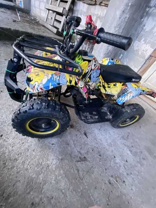 Vand atv 49cc  pretul este fix