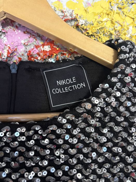 Блестяща коктейлна рокля Nikole Collection с пайети