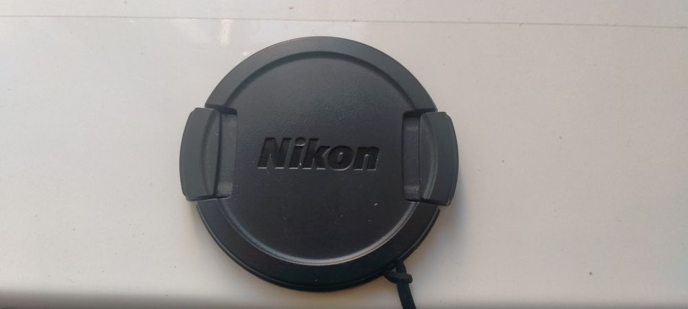 Крышка объектива Nikon.