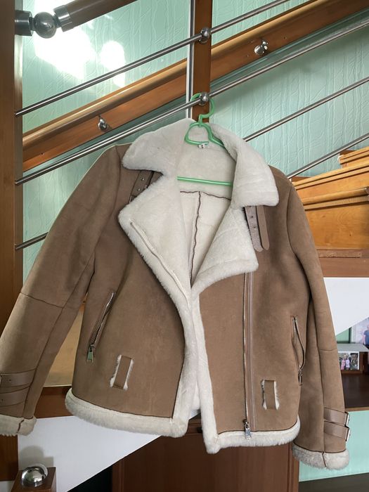 продам теплую дубленку