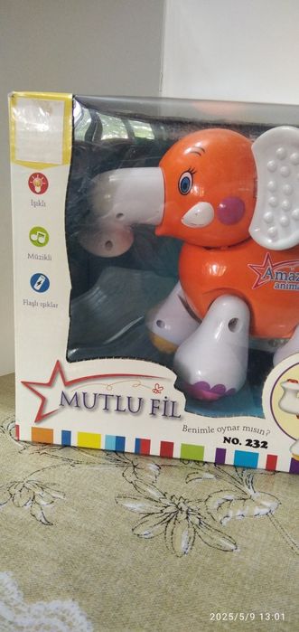 Заводная игрушка - Слоник.