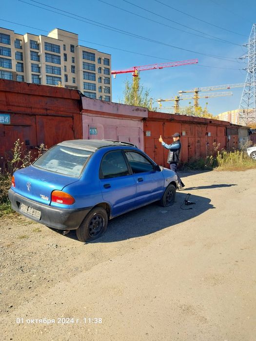 Мазда 121 в сборке на запчасти