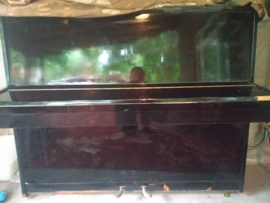 Пианино черного цвета