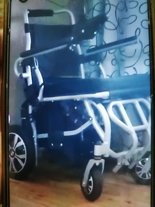 Инвалидная коляска с электроариводом