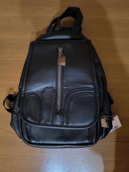 Ghiozdan cu multe buzunare