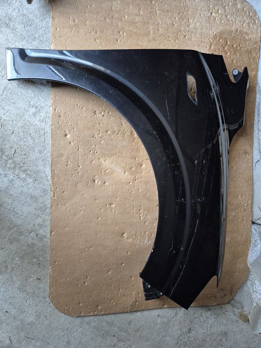 Aripa dreapta Dacia Logan 3