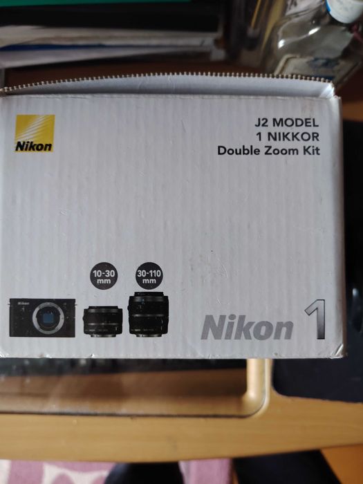 Nikon 1 j 2 с двумя объективами.