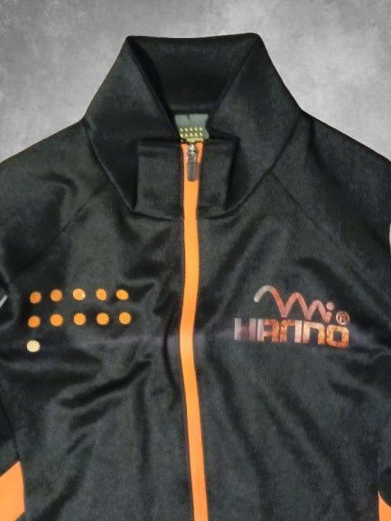 De vânzare Geacă sport XIOM x HANNO, negru cu portocaliu, unisex.