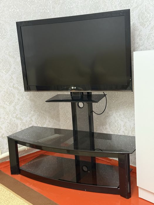 Телевизор ЛДЖ подставкамен бирге