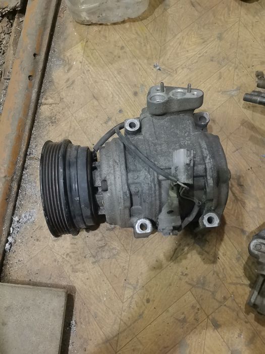 Тойота Камри /Карина /Калдина компрессор кондиционера.