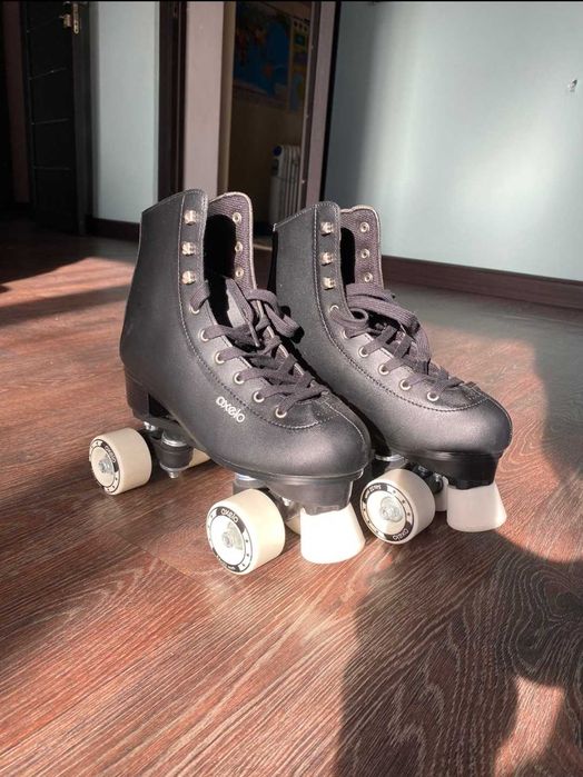 Роликовые коньки