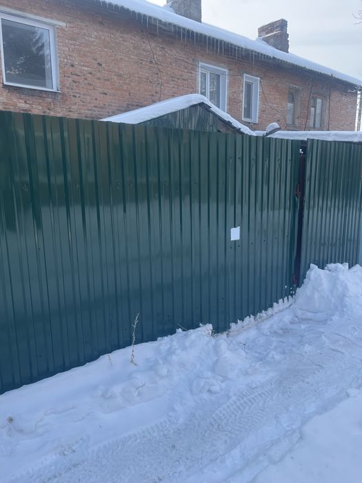 Квартира с двухэтажной планировкой с земельным участком