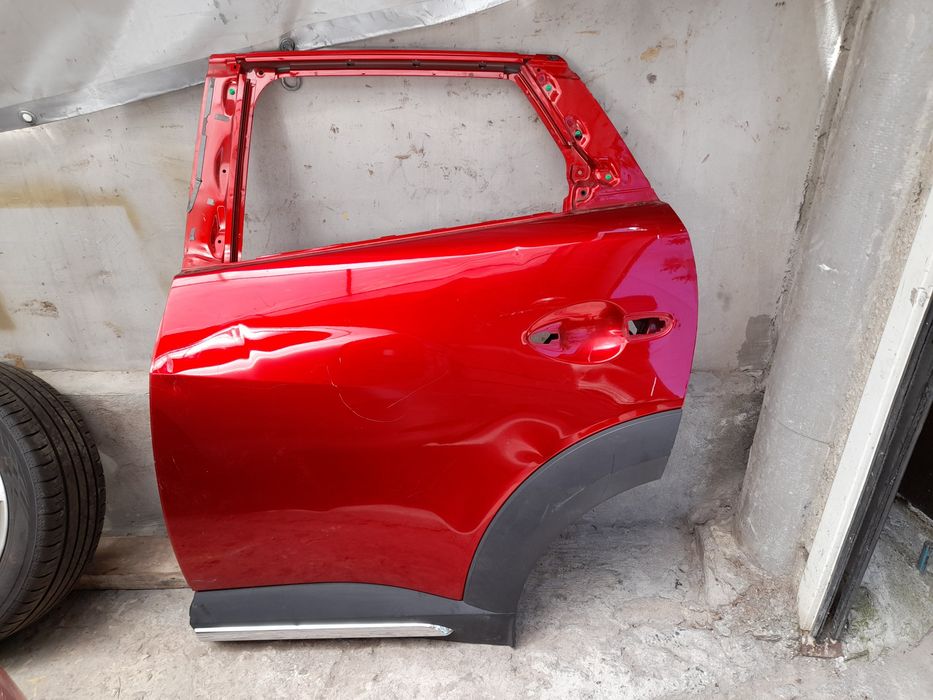 Задна лява  врата мазда цх3 Mazda CX3