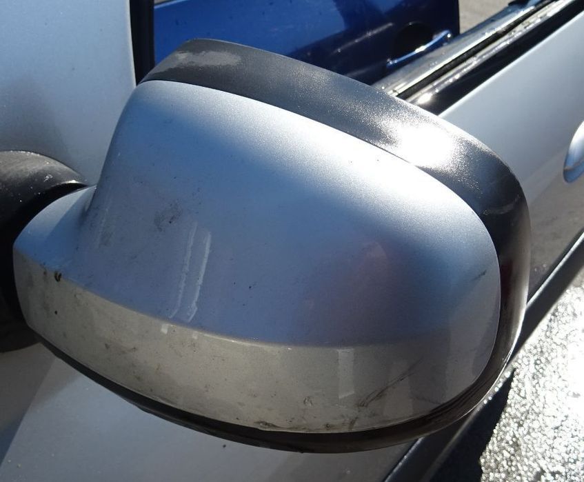 Oglinda stanga Dacia Logan MCV din 2009 volan pe stanga